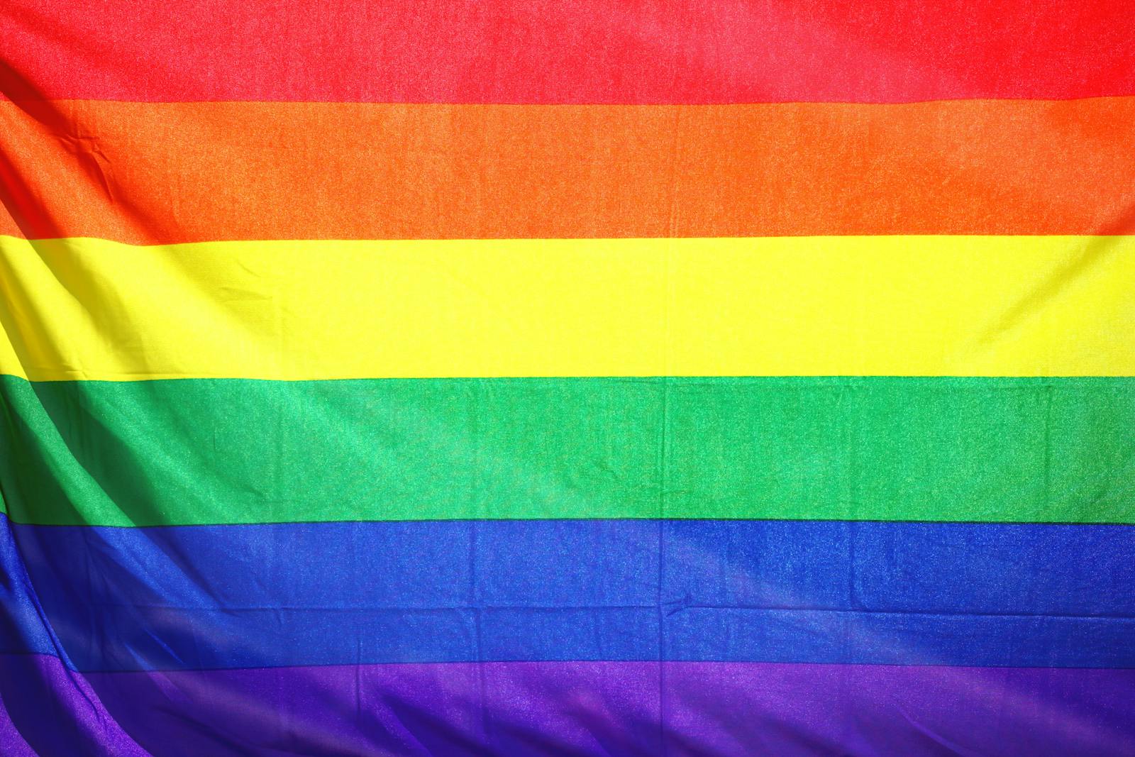 Close-up of a colorful rainbow flag symbolizing LGBT pride and diversity.